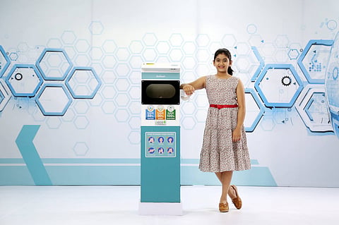 Put your hands into the machine, and presto! They get cleaned with a soap-water mist