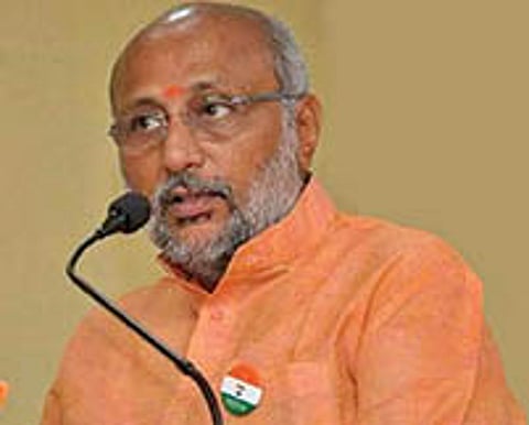 Radhakrishnan: strong RSS background