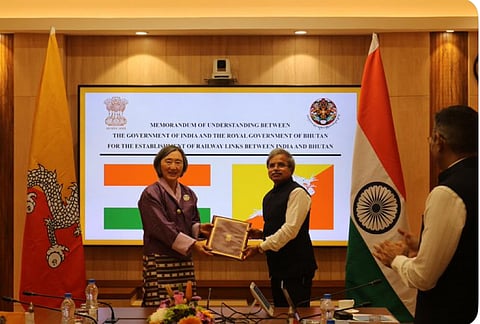 Connecting countries: Choden and Kumar signing the MoU