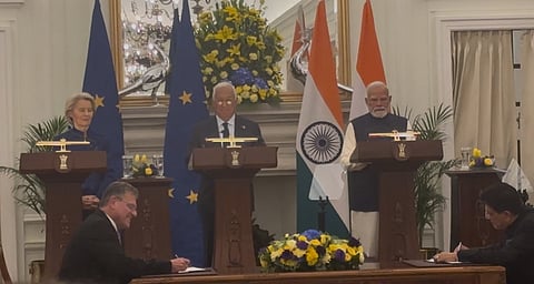 Ursula, Costa and Modi look on as the historic deal is being signed