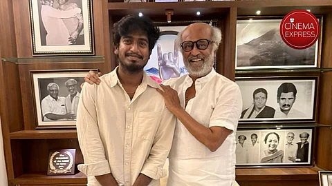 Abishan Jeevinth, director of Tourist Family, with Rajinikanth