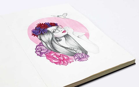 Self Portrait.
Ruchita’s signature flowers obviously make their way into her portrait; scale and colour of the same to be noted!