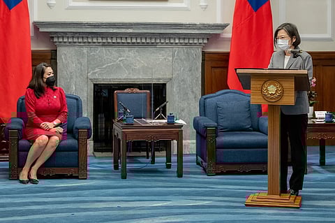 This handout photo taken and released by Taiwan's Presidential Office on September 8, 2022 shows Taiwanese President Tsai Ing-wen (R) speaking during a meeting with a US congressional delegation led by US Representative Stephanie Murphy (L) at the Presidential Office in Taipei. (AFP)