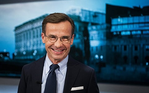 (FILES) In this file photo taken on September 9, 2022 Ulf Kristersson, leader of the Moderate Party in Sweden is pictured in a studio prior to a debate with other party leaders, organised SVT in Stockholm, ahead of the general elections on September 11, 2022, - Swedish Prime Minister Magdalena Andersson on on September 14, 2022 announced that she would resign after an unprecedented right-wing and far-right bloc appeared on course to win the general election. (Photo by Jonathan NACKSTRAND / AFP)