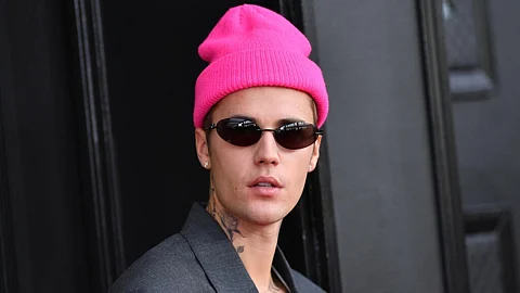 Canadian singer-songwriter Justin Bieber arrives for the 64th Annual Grammy Awards at the MGM Grand Garden Arena in Las Vegas on April 3, 2022 | ANGELA WEISS AFP