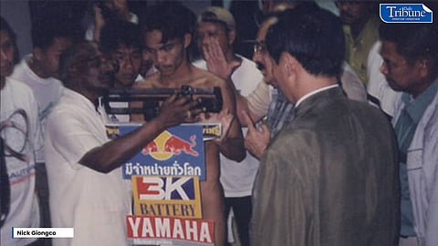 A naked Manny Pacquiao tries to make the 112 lbs weight limit for his WBC flyweight title fight vs Thailand's Medgoen '3k Battery' Singsuran on 17 September 1999. Photo by Nick Giongco.