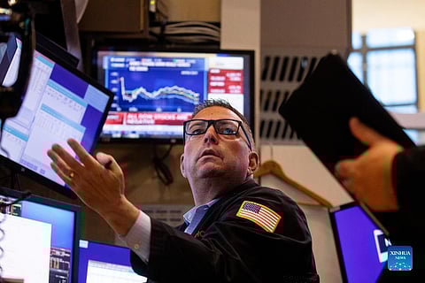 Investors digested on Friday a couple of economic reports that showed a muddy picture of the US economy. Initial jobless claims came in better than expected, but import prices dropped less than estimated. | Michael Nagle/Xinhua