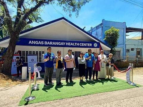 Turning over the refurbished health centers are (from left) SM City Daet Mall Manager Lino Franco Morales, Barangay Captain Salvador Bartolome Jr., Basud Mayor Adrian Davoco, SMFI’s Connie Angeles, Engr. Jason Terrenal, SAVP, SM Supermalls, SMFI’s AVP Cristie Angeles, Fr. Noel Domingo and SMFI’s Neny Regino. | Photograph courtesy of SM Foundation