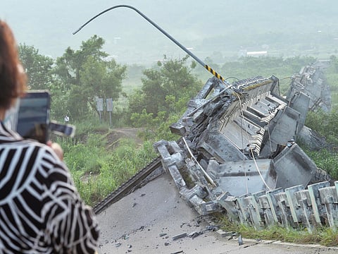 Roads in Hualien county were torn up by Sunday's quake Sam Yeh AFP