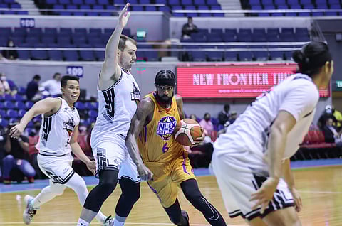 NLEX's Earl Clark drives past Blackwater's Cameron Krutwig. Photo by Rio Deluvio / Daily Tribune