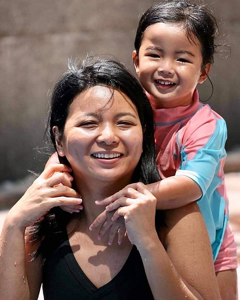 A young Alex Eala and her mother Rizza — who used be a national swimmer — share some quality time together. | Photograph courtesy of Alex Eala