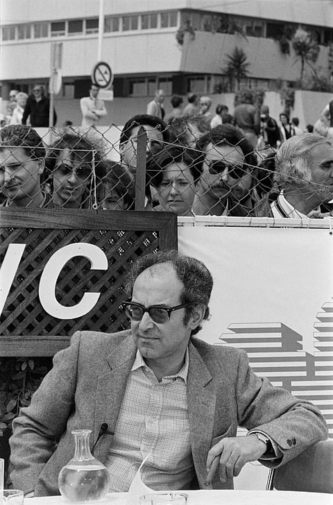 In this file photo taken on 10 May 1985, Franco-Swiss film director Jean-Luc Godard gives a press conference about his film "Detective" at the 38th International Film Festival in Cannes. Godard died "peacefully" on 13 September 2022 at his home in the small town of Rolle in Switzerland, his family said in a statement. (Photo by RALPH GATTI / AFP)