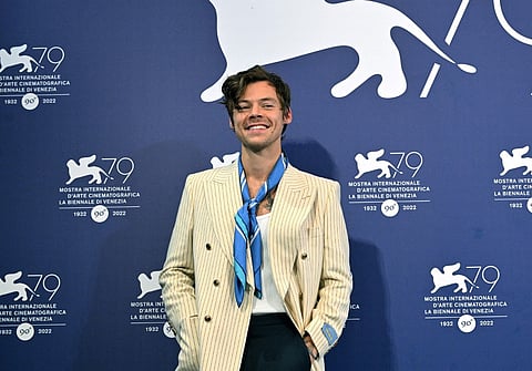 British singer and actor Harry Styles poses during a photocall for the film "Don't Worry darling" presented out of competition as part of the 79th Venice International Film Festival at Lido di Venezia in Venice, on 5 September 2022. (Photo by TIZIANA FABI / AFP)