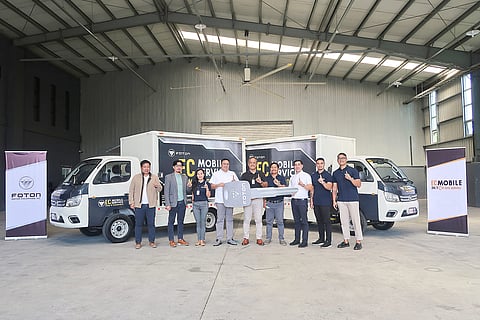 EXECUTIVES turnover the EC Mobile units. | PHOTOGRAPH COURTESY OF FMPI
