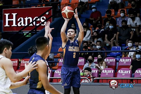 JL de los Santos elevates for Jose Rizal University against Emilio Aguinaldo College in their Season 98 NCAA basketball tournament game yesterday. The Heavy Bombers won, 97-74. | Photograph courtesy of NCAA