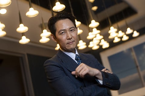 Smash hits like "Squid Game" and "Parasite" make it looks easy, but Emmy winner Lee Jung-Jae says South Korean cinema spent years learning how to reach unprecedented global audiences through stories about the competitiveness and violence of modern life. (Photo by VALERIE MACON / AFP)