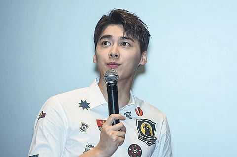 This photo taken on 4 August 2017 shows Chinese actor Li Yifeng attending an event in Hangzhou, in China's eastern Zhejiang province. Global brands including Prada and Remi Martin have severed ties with the popular Chinese actor after he was detained for soliciting sex workers amid a government crackdown on the entertainment industry. (Photo by AFP / China OUT)