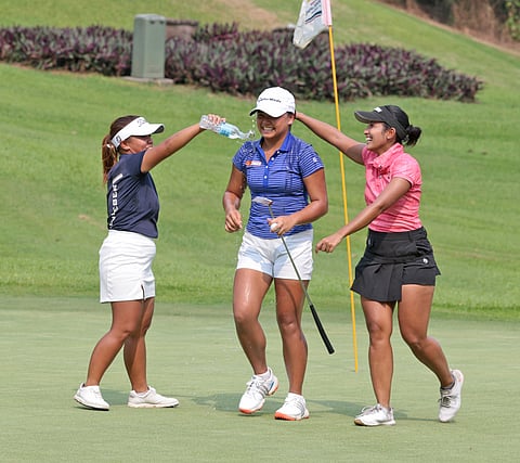 RED-HOT Rianne Malixi gets doused by playing partners Harmie Constantino and Marvi Monsalve following her huge victory. | Photograph by joey sanchez mendoza for the daily tribune @tribunephl_al