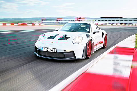 PHOTOGRAPHS COURTESY
OF PORSCHE
THIS demigod is characterized by a large number of functional aerodynamic elements.