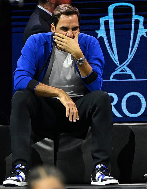 Team europe players Switzerland's Roger Federer reacts during the first tennis match during the 2022 Laver Cup at the O2 Arena in London on September 25, 2022. (Photo by Glyn KIRK / AFP) / RESTRICTED TO EDITORIAL USE
