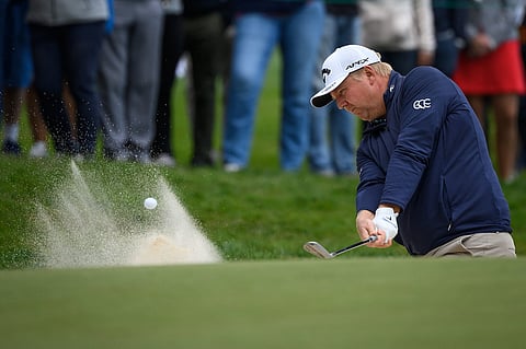 FABRICE COFFRINI/AGENCE FRANCE-PRESSE
ROSS McGowan has company at the summit entering the final round of the 2022 Made in HimmerLand tournament.