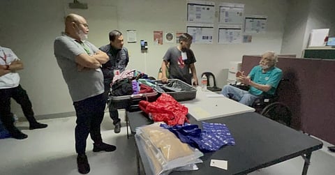 Government agents interrogate drug smuggling suspect Stephen Joseph Szuhar