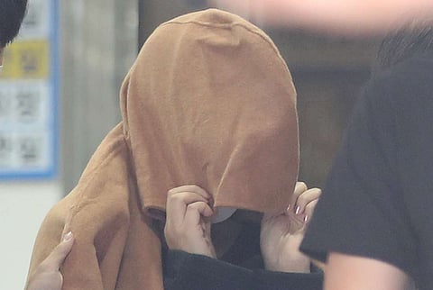 ‘Mom’ of dead children in suitcases arrested