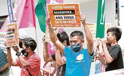 Power struggle Consumer groups, cooperatives and organizations that are part of the Power for People Coalition on Thursday, 15 September 2022, demand that San Miguel Corporation stop its plan to pass on its alleged P5-billion losses to consumers amid skyrocketing gas and coal prices. | PHOTOGRAPH BY ANALY LABOR FOR THE DAILY TRIBUNE @tribunephl_ana