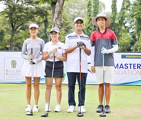 Photograph courtesy of Nikki ng
WINNERS in the recent 13th Abalos Cup at the Wack Wack Golf and Country Club in Mandaluyong. From left: Reese Ng, low gross champion; Celine Abalos, low net champion; Rajah Crisostomo and Zach Villaroman, low net champion.