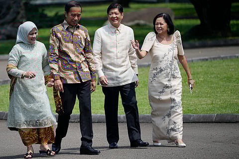 President Ferdinand ‘Bongbong’ Marcos Jr. (second from right) and First Lady Louise Araneta-Marcos (right) walk with Indonesian President Joko Widodo (second from left) and Indonesian First Lady Iriana Widodo after a tree-planting activity at the Presidential Palace in Bogor, West Java on Monday. | Achmad Ibrahim / POOL/AGENCE FRANCE-PRESSE