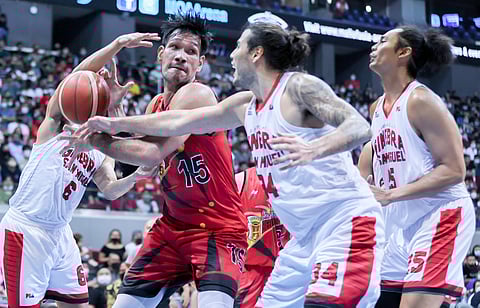 Ginebra defenders stop San Miguel's June Mar Fajardo from scoring during the PBA Philippine Cup at the Mall of Asia Arena in Pasay, June 24, 2022. Photo by Rio Deluvio