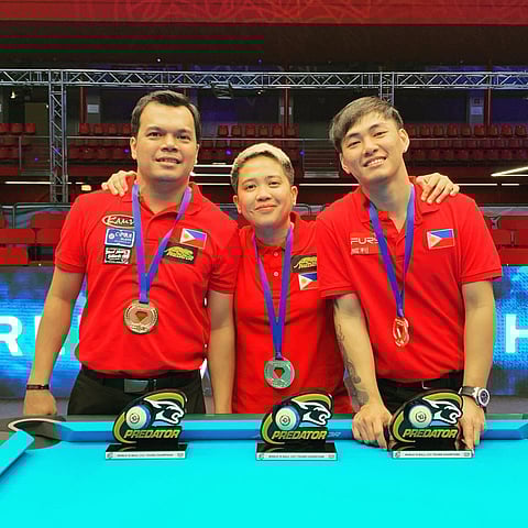 PHOTOGRAPH COURTESY OF PREDATOR
FILIPINO cue artists smile after emerging victorious in the 2022 Predator World Teams 10-Ball Championship in Klagenfurt, Austria. From left: Carlo Biado, Rubilen Amit and Johann Chua.