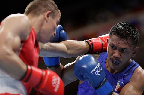 UESLEI MARCELINO/AGENCE FRANCE-PRESSE
Eumir Marcial has vowed to carry the national flag in international competitions.