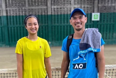 PHOTOGRAPH COURTESY OF KARL SANTAMARIA
COACH Karl Santamaria poses with star student Alex Eala in this undated photo.