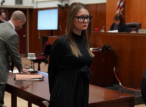 Fake German heiress Anna Sorokin is led away after being sentenced in Manhattan Supreme Court 9 May 2019. Photo by TIMOTHY A. CLARY / AFP)