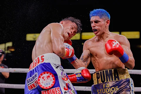 PHOTOGRAPH COURTESY OF SHOWTIME
FERNANDO Martinez of Argentina punishes Jerwin Ancajas during their IBF junior bantamweight title match in Carson California.