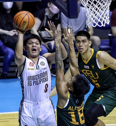 GerryAbadiano and the University of the
Philippines get past Far Eastern University,
73-67, in Season 85 UAAP basketball
tournament at the Smart Araneta Coliseum. Photo by Rio Deluvio