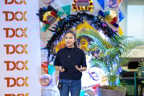 Eliza Acuña, vice president for Business Strategy of TDCX Philippines announces the unveiling of its newest hub in Pavia, Iloilo, adding to its current campuses in Manila and Cebu, and other parts of the world. | Photograph courtesy of TDCX Philippines