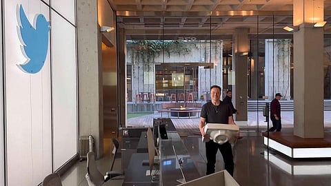 Earlier, Musk changed his Twitter profile to "Chief Twit" and posted a video of himself walking into the company's California headquarters carrying a sink. (Video grab / Elon Musk Twitter / AFP VIA GETTY IMAGES)