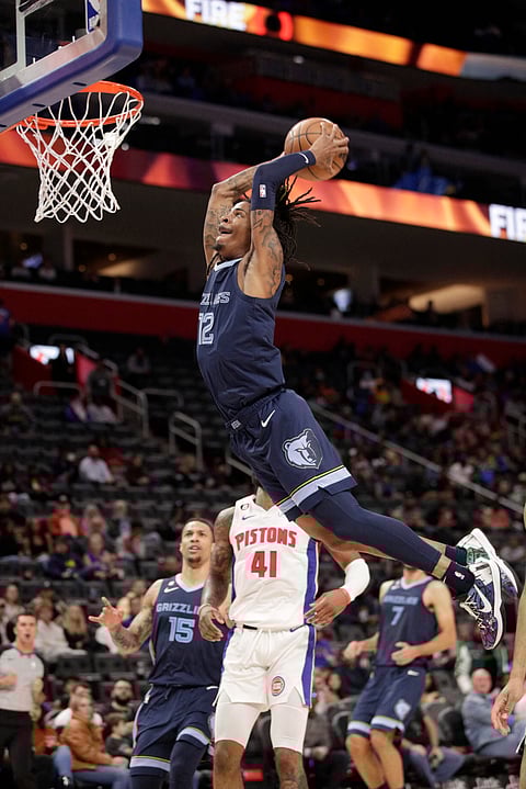 JA Morant fires 31 points to lift the Memphis Grizzlies to a 126-111 win over the Detroit Pistons in the final match of the NBA preseason. | BRIAN SEVALD/agence france-presse