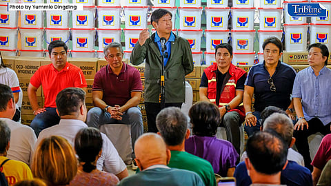 President Ferdinand Marcos Jr. leads the distribution of assistance to victims of typhoon "Paeng" in Barangay Jose II, Noveleta, Cavite on 31 October 2022. (Photo by Yummie Dingding)
