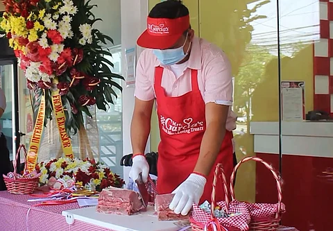 Photographs Courtesy of Meatworld International Inc.
Mrs. Garcia’s Meatshop’s symbolic ceremonial chopping with the master butcher.