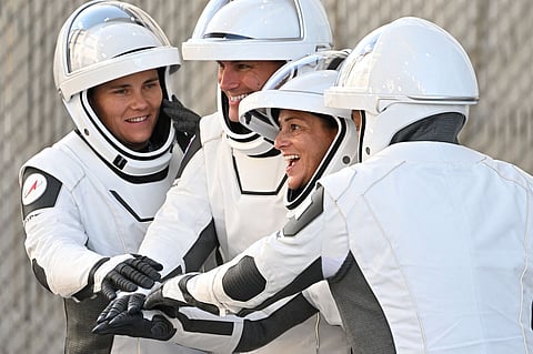 RUSSIAN cosmonaut Anna Kikina (left) is shown ahead of the launch of the SpaceX Falcon 9 rocket, with NASA astronauts Josh Cassada and
Nicole Mann, as well as Japan’s Koichi Wakata. | JIM WATSON/Agence France-Presse
