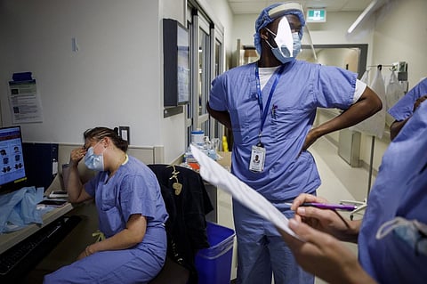 Burnout from the Covid-19 pandemic, abuse from patients, and salary discontent have seen nursing staff across Canada quitting their jobs in droves, and experts say the situation is only likely to worsen. (Photo by COLE BURSTON / AFP)