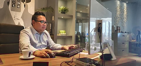 Renesar Deunida, SARTiNE CEO, at his office during his Gising Na! interview on Friday. | PHOTOGRAPHS by MICHAEL PINGOL for the daily tribune