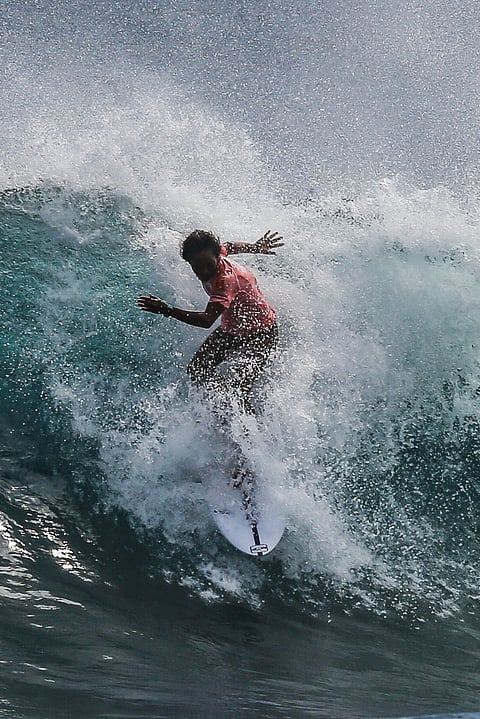 Filipino surfer Robert Magaluna rides over grizzly waves in the 26th Siargao International Surfing Cup men’s division at Siargao Island’s world-renowned Cloud 9 surfing spot. | PHOTOGRAPH COURTESY OF ALVIN KASIBAN