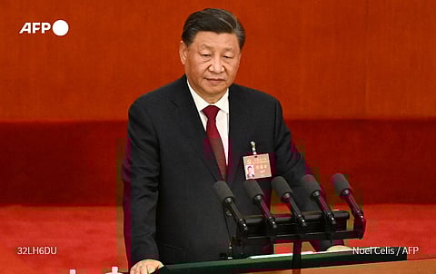 China's 20th Communist Party Congress ended in Beijing after leader Xi Jinping presided over seven days of closed-door meetings with top officials. 'Dare to struggle, dare to win, bury your heads and work hard, be determined to keep forging ahead,' Xi said. (Photo by NOEL CELIS / AFP)