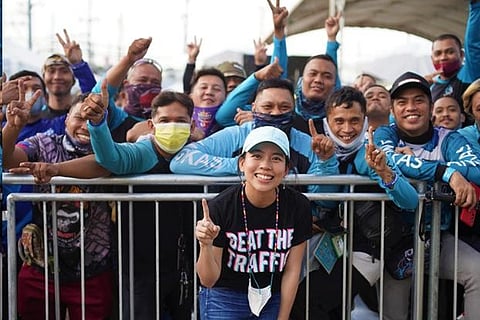 Angkas founder Angeline Tham with Angkas riders