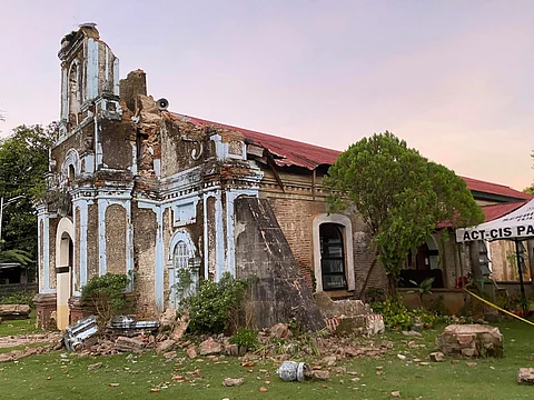 This handout photo taken Wednesday from the Facebook page of parish priest Christian Edward Padua, shows a damaged church of the Iglesia Filipina Independiente in La Paz town, Abra province, a day after a 6.4-magnitude quake struck the province.