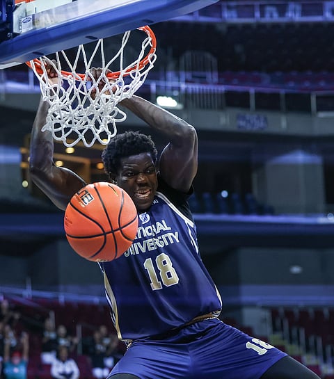 Omar John of National University scores on a rim-rattler to power the Bulldogs to an 80-76 win over De La salle University in Season 85 UAAP basketball at the Mall of Asia Arena. Photo by Rio Deluvio